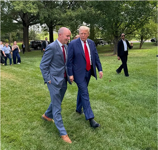 governor cox and president trump walking