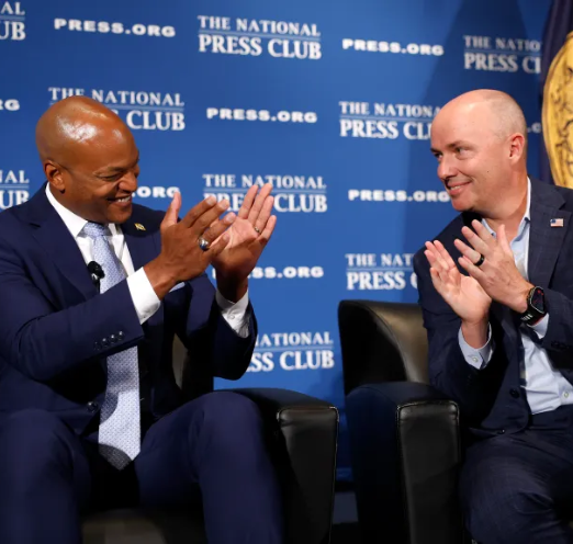 Coalition at a podium