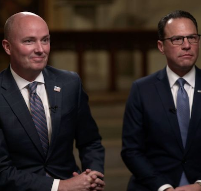 Coalition at a podium